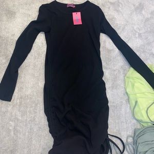 Plain black dress with ties on the sides